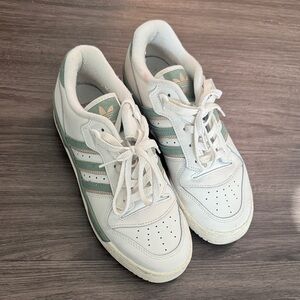 Adidas Women's White Sneakers with Green Stripes